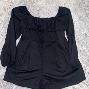 Beautiful Black jumper with ripples on the top